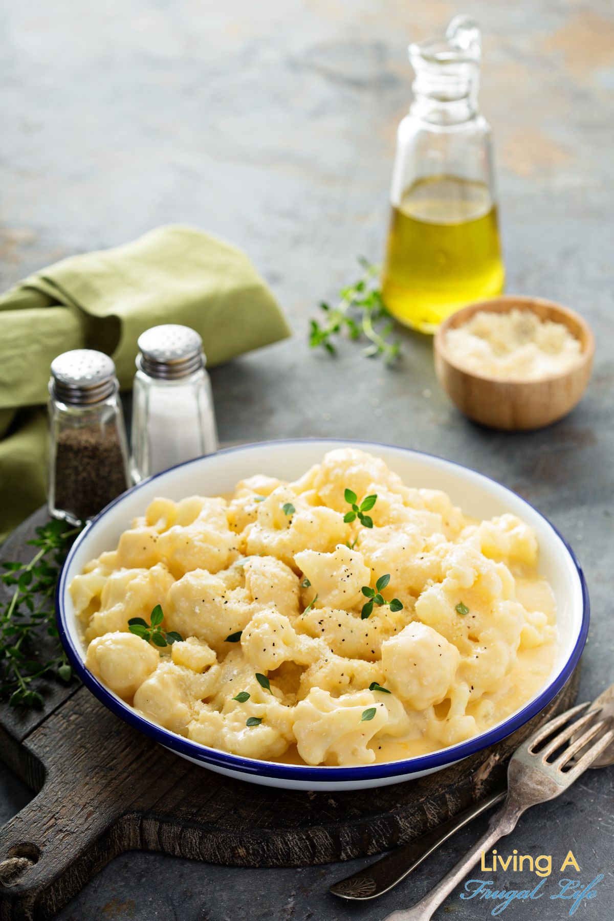 A bowl of Cauliflower with cheese sauce.