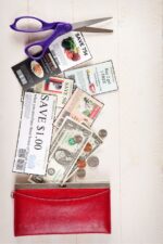 a pocket of coupons, money and scissors for clipping.